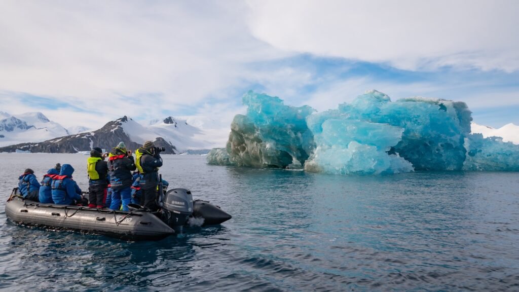 Photographing blue glacier ice in Cierva Cove, Antarctic Peninsula